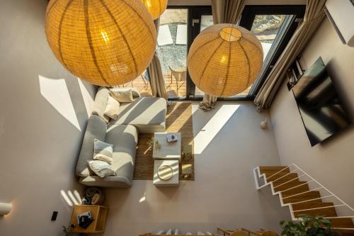 an overhead view of a living room with two lights at Oasis Village Eforie Nord in Eforie Sud