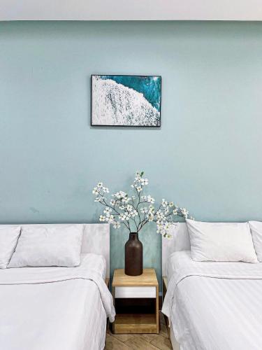 Una cama o camas en una habitación de MIDMOST C22 Apartment