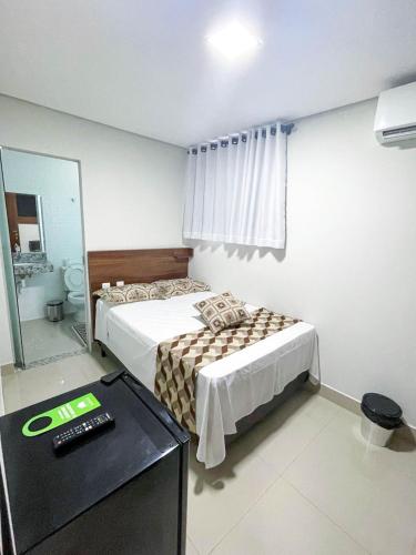 Katil atau katil-katil dalam bilik di Hotel Minas