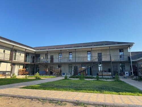 an exterior view of a building at TAMIR House in Tossor