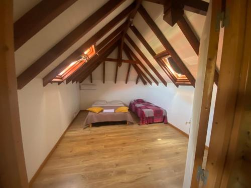 Postel nebo postele na pokoji v ubytování Villa Lolyka