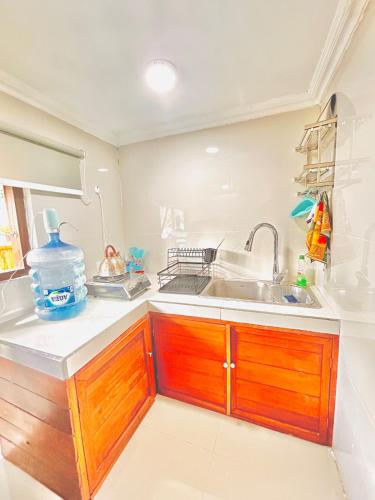 a kitchen with a sink and a counter top at Rustic Loft Bungalow in Jimbaran in Jimbaran