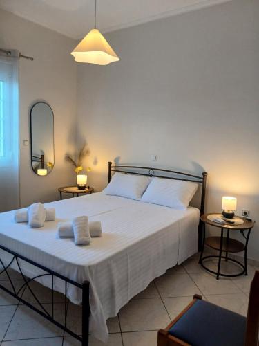 Ένα ή περισσότερα κρεβάτια σε δωμάτιο στο Deilino Apartment