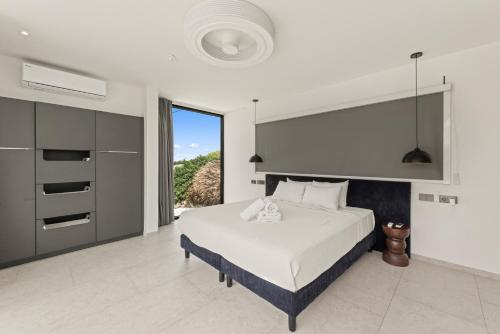 Ένα ή περισσότερα κρεβάτια σε δωμάτιο στο Villa Sea View Luxury
