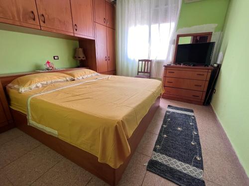 Llit o llits en una habitació de Apartment H&S