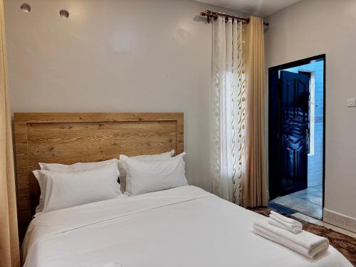 The Vista Residenceにあるベッド