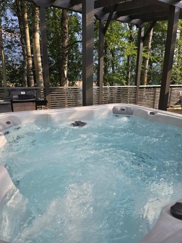 a jacuzziificialificialificialificialificialificialificialificialificialificialificial at The Haven of Riverside - Villa Sieripirtti in Rovaniemi