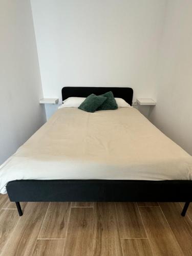 Ένα ή περισσότερα κρεβάτια σε δωμάτιο στο Habitacion privada con baño privado III