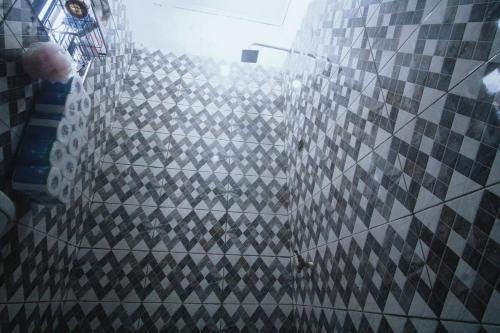 a view of a building with tiles on it at Peaceful Apartments 