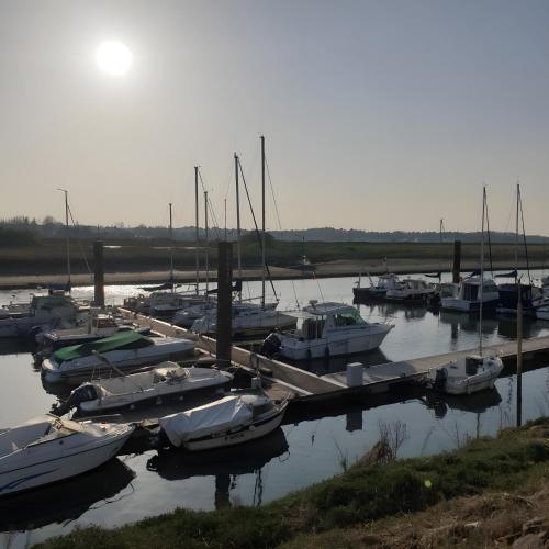 a group of boats docked in a marina at Appartement en bord de mer in Étaples