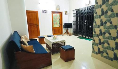 Televisyen dan/atau pusat hiburan di Shantiniketan A Green Haven