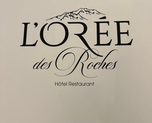 a logo for a hotel restaurant with a mountain at Hôtel l'Orée des Roches in Saales