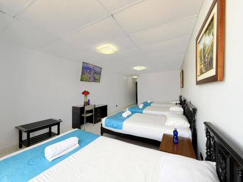 Hotel Santamaria en Quito by Lauzaにあるベッド