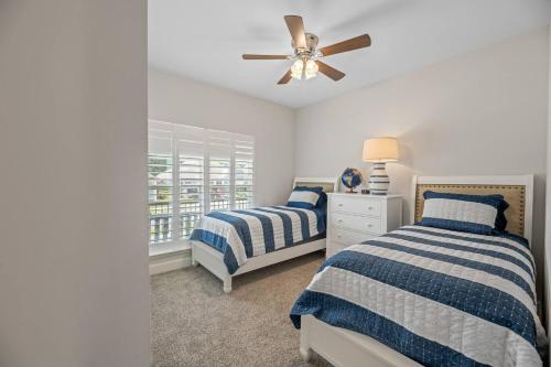 Ένα ή περισσότερα κρεβάτια σε δωμάτιο στο Spacious 4BR Home Near Midtown & FSU