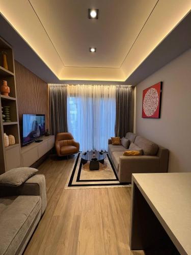 Χώρος καθιστικού στο The Diamond In City Luxury Suites By ZENORA Living