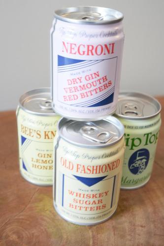 a group of six open cans of old fashioned beer at City Loft Hotel in Beaufort