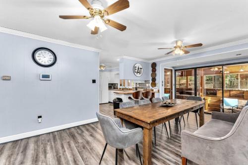 a dining room with a table and chairs at Spacious Augusta Retreat Near Augusta National in Augusta