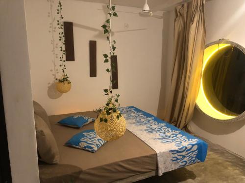 En eller flere senge i et værelse på Dana's Villa