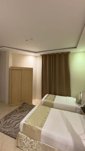 Postel nebo postele na pokoji v ubytování فندق ترند- trend hotel