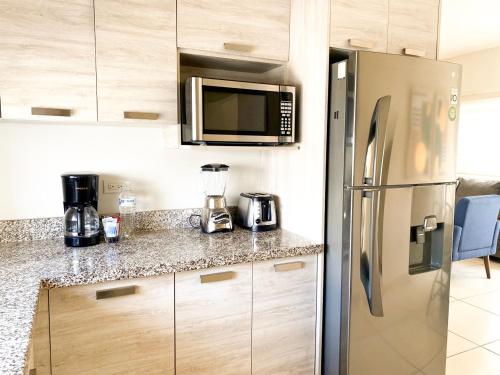 Dapur atau dapur kecil di Casa Familiar con Alberca en Privada, 5 min del Aeropuerto y Consulado Americano