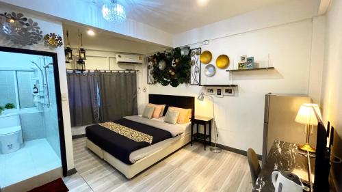 Ένα ή περισσότερα κρεβάτια σε δωμάτιο στο Beach Gallery House