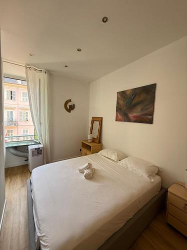 Llit o llits en una habitació de Maison Ferro Menton