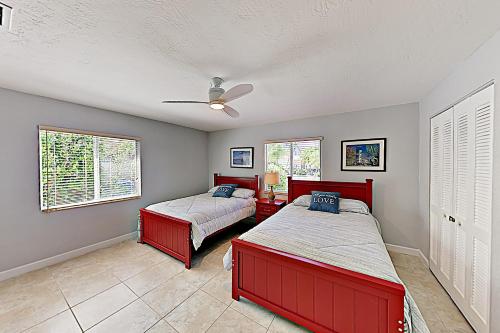 Postel nebo postele na pokoji v ubytování Coral Cove