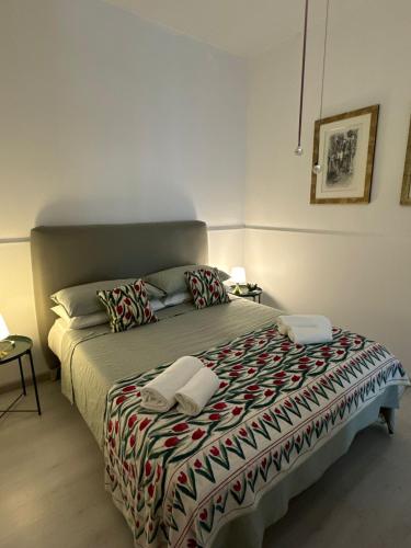 Ένα ή περισσότερα κρεβάτια σε δωμάτιο στο Plumeria La casa di Francesco