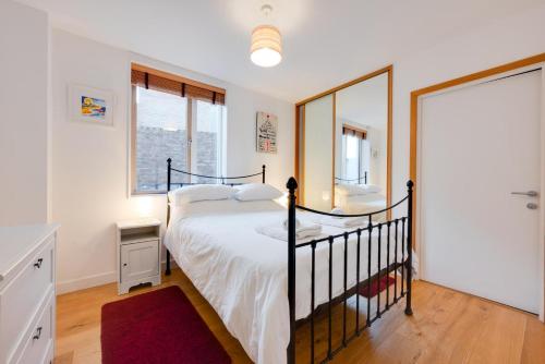 En eller flere senge i et værelse på Turnstones