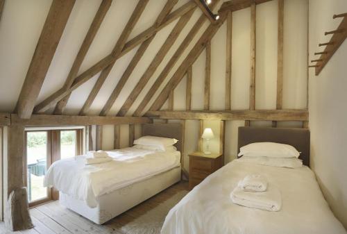 Postel nebo postele na pokoji v ubytování Reindeer Cottage Sternfield