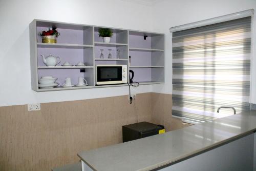 Kuchyň nebo kuchyňský kout v ubytování Couple Suite