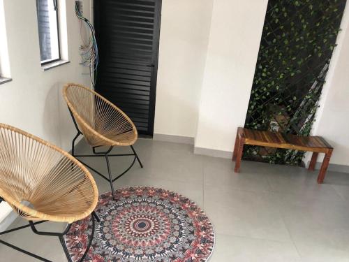 Ruang duduk di Suite para 2 pessoas