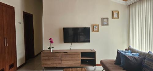 Altamira Apart Suitesにあるテレビまたはエンターテインメントセンター