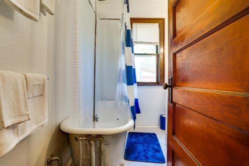 a bathroom with a sink and a shower at Great for Travel Nurses, Remote Workers! MPLS Home in Minneapolis