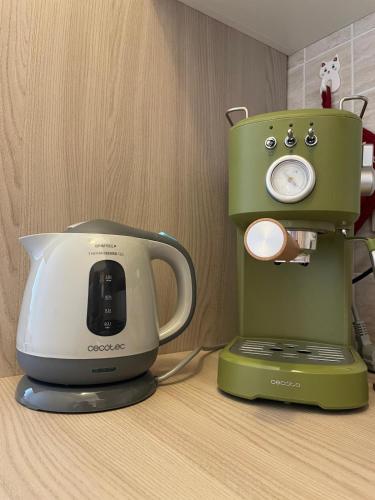 a coffee maker sitting on top of a table at Il Tramonto in Altino