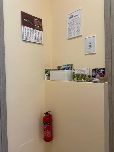 a room with a fire hydrant on a wall at Il Tramonto in Altino