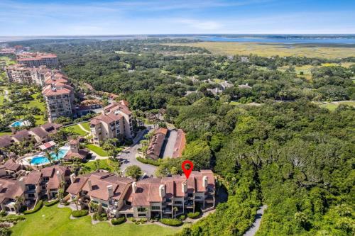 an aerial view of a mansion with a red marker on it at 1401 Windsong in Amelia Island