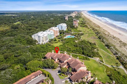 an aerial view of a resort and the beach at 1401 Windsong in Amelia Island