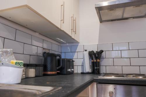 Η κουζίνα ή μικρή κουζίνα στο Stylish Apartment S3