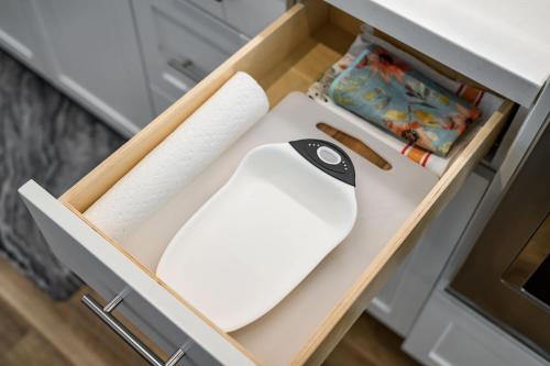 a drawer with a knife and paper in it at Central Location Master Bedroom w Shared Bathroom in Irvine