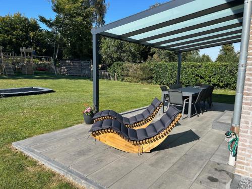 Taman di luar Ferienhaus "Familytime" mit großem Garten