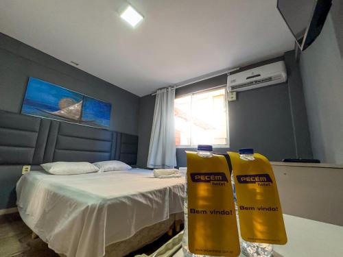 Katil atau katil-katil dalam bilik di Pecém Hotel