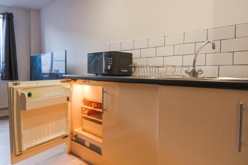 Η κουζίνα ή μικρή κουζίνα στο Stylish Apartment S3