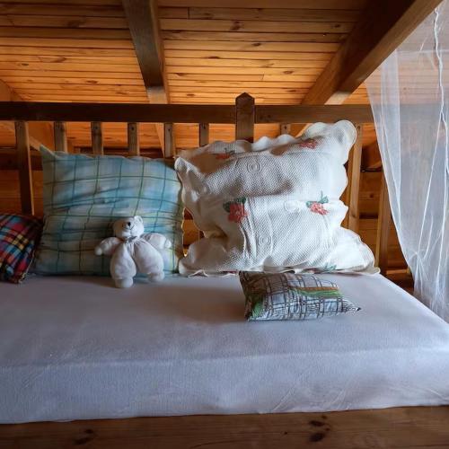Les chalets Colibris - Anse Figuierにあるベッド
