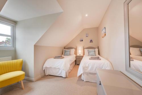 Voodi või voodid majutusasutuse Curlew Cottage toas