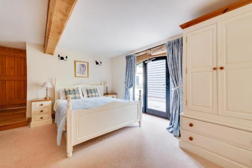 Katil atau katil-katil dalam bilik di Owls End at Wattisham Hall