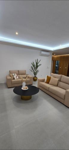 Ruang duduk di Suite Beverly Luxury