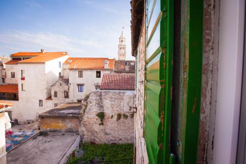 a view of a city from a window at Golden Gate Dream Rooms in Split