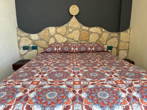 Postel nebo postele na pokoji v ubytování orula experiences