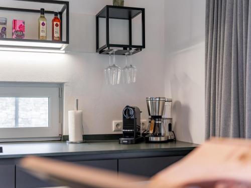 a kitchen with a counter top with a blender at Grebenzen Lodge 55 in Sankt Lambrecht